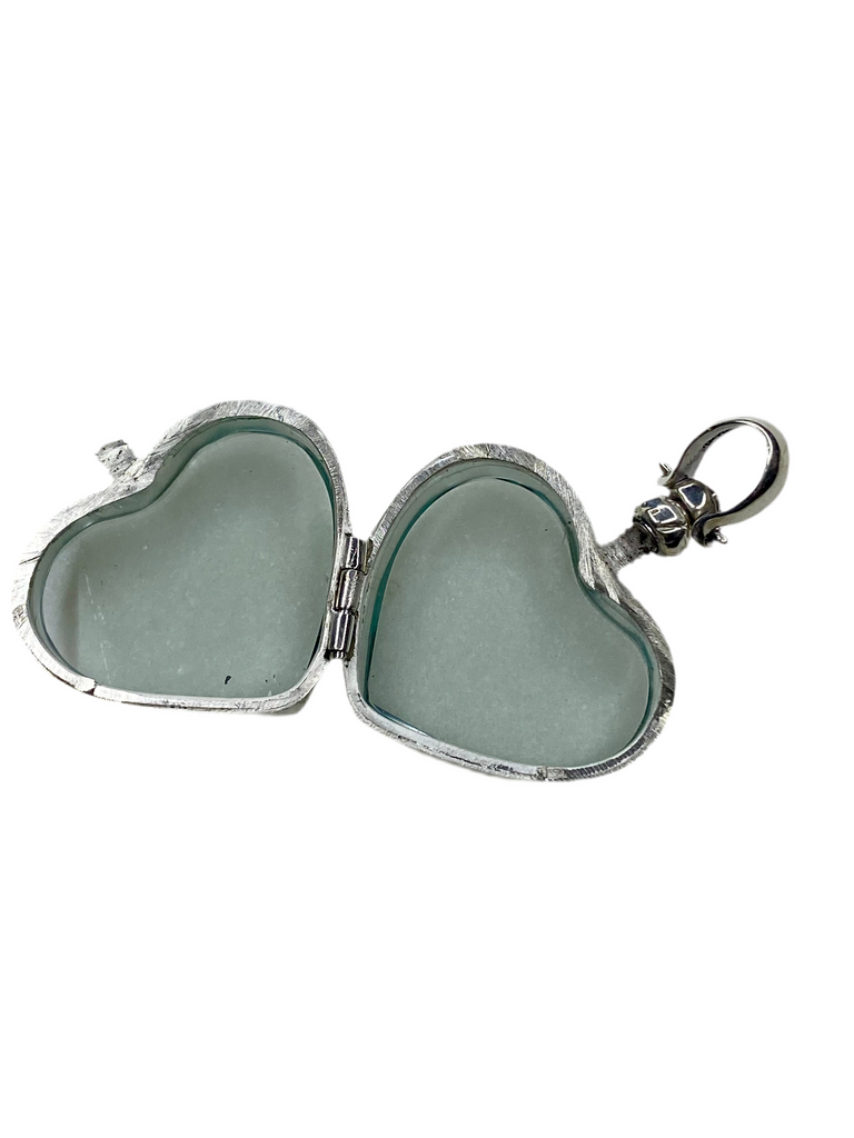 Glass heart locket