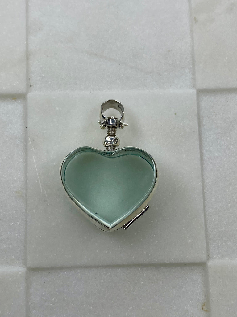 Glass heart locket