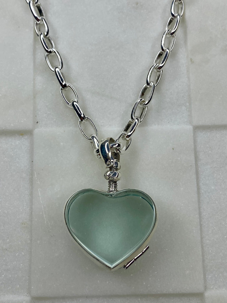 Glass heart locket