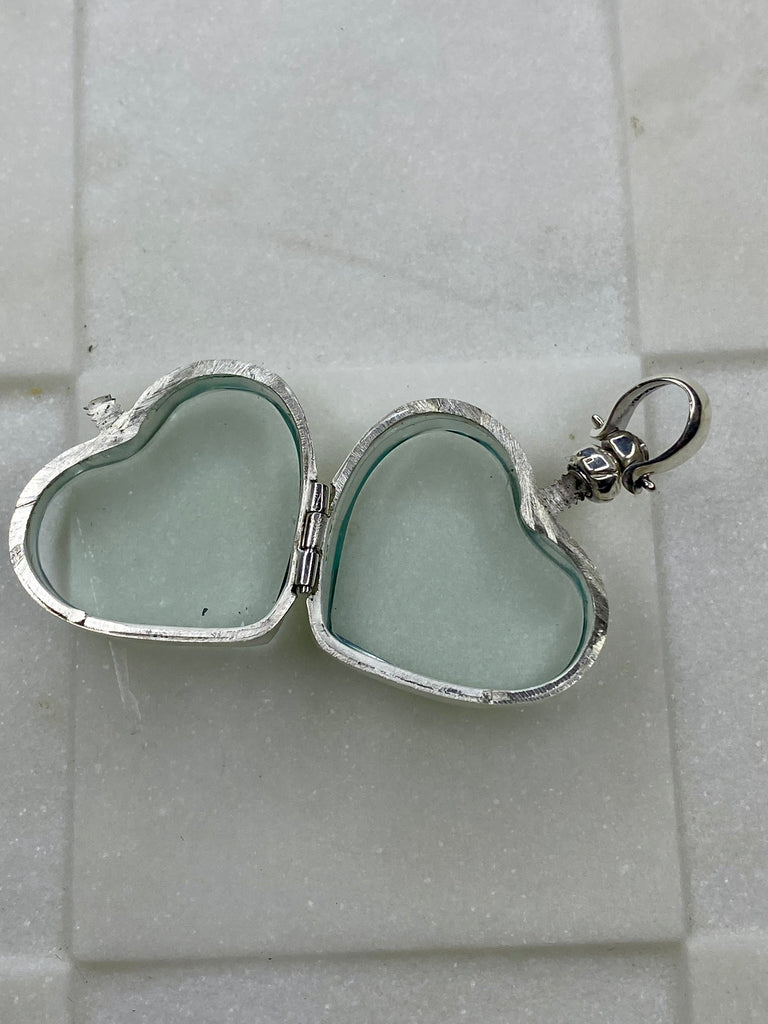 Glass heart locket