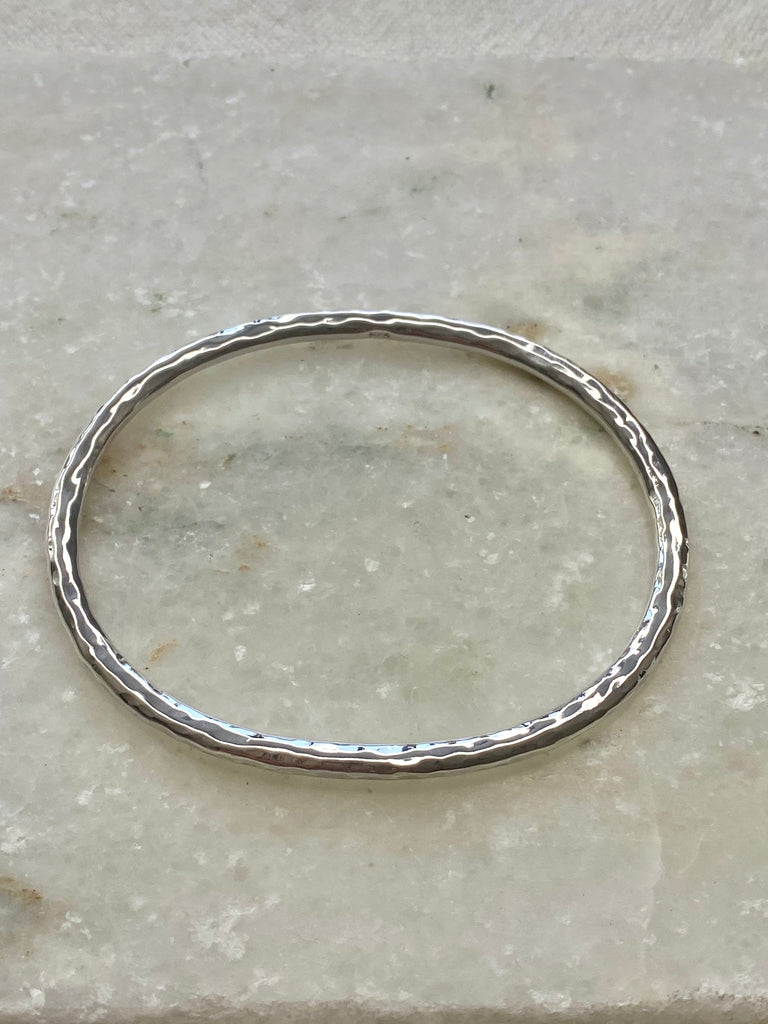 Hammered oval hammered stacking bangle